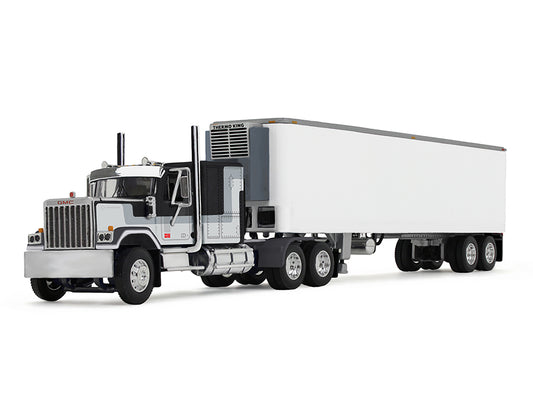 GMC General with 60" Flat Top Sleeper and 40' Vintage Refrigerated Trailer Black with Gray and White Stripes 1/64 Diecast Model by DCP/First Gear