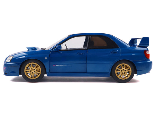 2003 Subaru Impreza WRX STI RHD (Right Hand Drive) Sonic Blue Metallic with Gold Wheels 1/18 Diecast Model Car by Solido