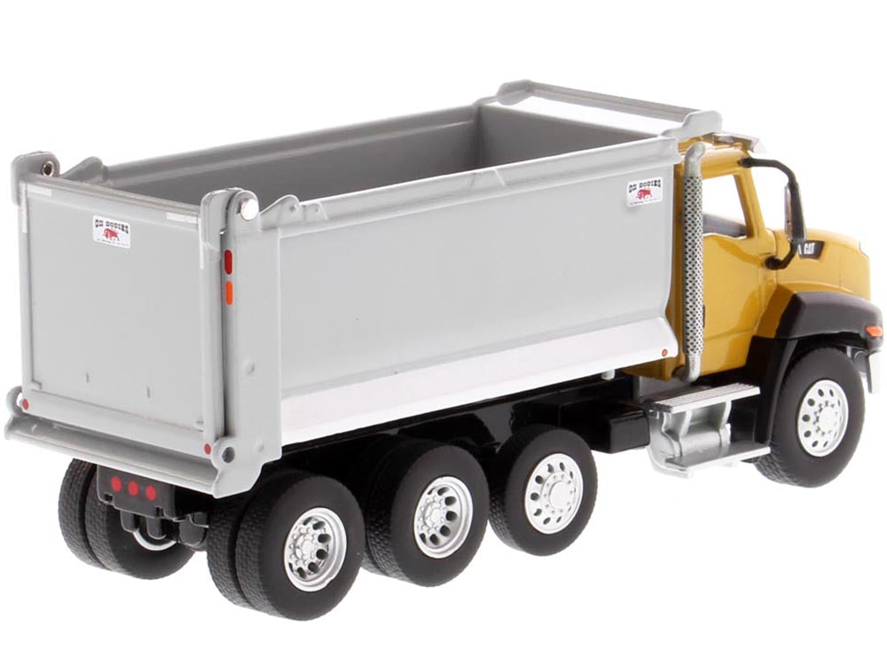 CAT Caterpillar CT660 Day Cab Tractor with OX Stampede Dump Truck "Play & Collect!" Series 1/64 Diecast Model by Diecast Masters