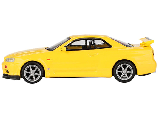 Nissan Skyline GT-R (R34) V-Spec RHD (Right Hand Drive) Lightning Yellow Limited Edition to 7920 pieces Worldwide 1/64 Diecast Model Car by Mini GT