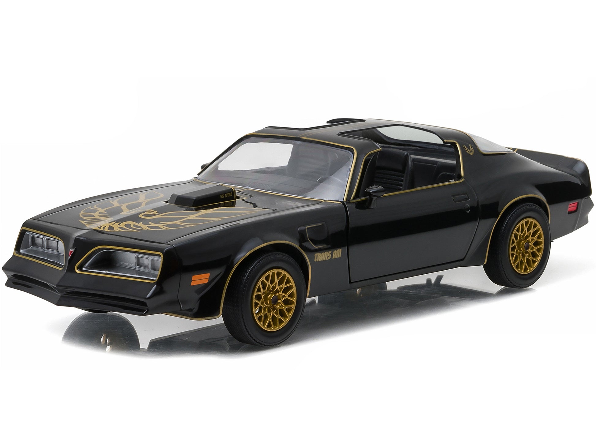 1977 Pontiac Firebird Trans Am T/A Starlite Black with Golden Eagle Hood and Stripes 1/24 Diecast Model Car by Greenlight